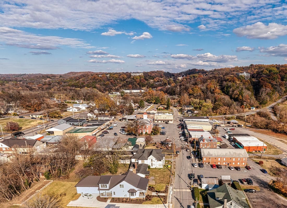 Johnson City, TN - Small Southern Town Square with Whiskey Barrel Houses on the Hill and Autumn Colors in Lynchburg, Tennessee